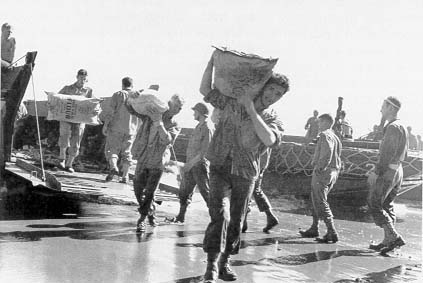 Unloading supplies on Guadalcanal