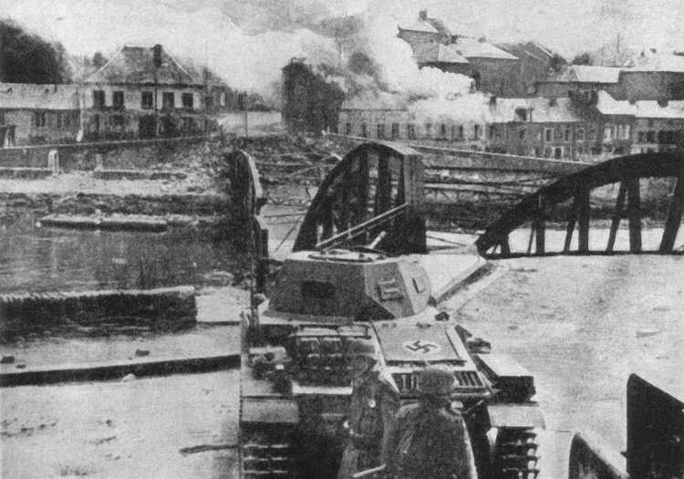 A Panzer II held up by a broken bridge during the Battle of France, June 1940. 