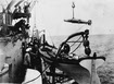 Hoisting 18in torpedo onto USS Maine (BB-10), c.1904-5 