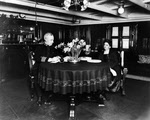 Captain and Mrs George S Slocum dining on USS Philadelphia (C-4) 