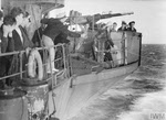 HMS Attacker receiving mail off Rhodes, 1944 