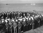 Admiral Burroughs congratulating crew of HMS Pursuer