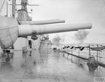 HMS Royal Oak firing 6in Guns 